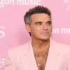 Quel Age A Robbie Williams