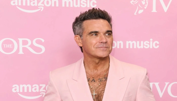 Quel Age A Robbie Williams