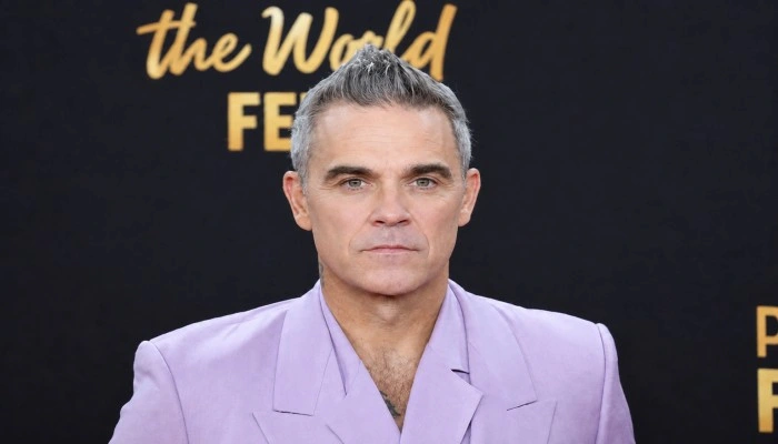 Quel Age A Robbie Williams
